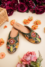 Dark green floral embroidered women juttis by Stepellas with handcrafted detailing