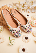 Off white floral embroidered women juttis by Stepellas handcrafted ethnic footwear