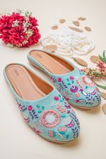 Stepellas sky blue ethnic juttis featuring intricate peach and coral floral mandala hand embroidery with beadwork.
