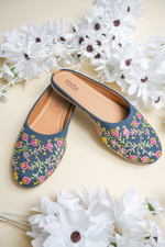 Designer Stepellas black block heels showcasing delicate pink and yellow floral vine handwork.