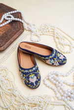 Blue floral embroidered women juttis by Stepellas with cushioned insole