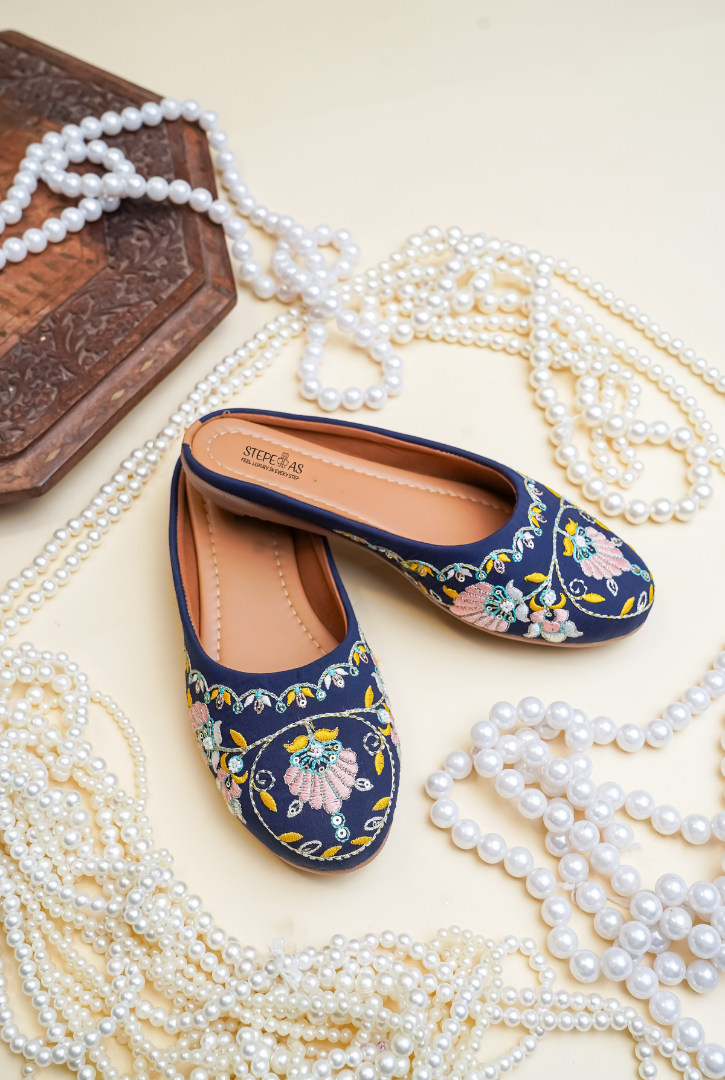 Blue floral embroidered women juttis by Stepellas with cushioned insole