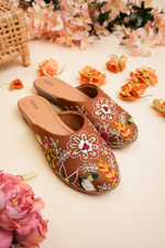 Top view of Stepellas branded coffee color juttis highlighting the soft cushioned tan insole for comfort.