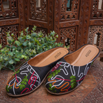 A collection of Stepellas branded black embroidered juttis with cushioned soles for wedding and party wear.