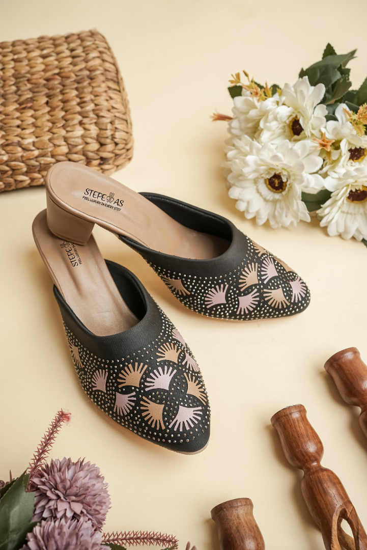 Elegant Stepellas black ethnic heels with shimmering stone work, perfect for wedding and festive occasions.