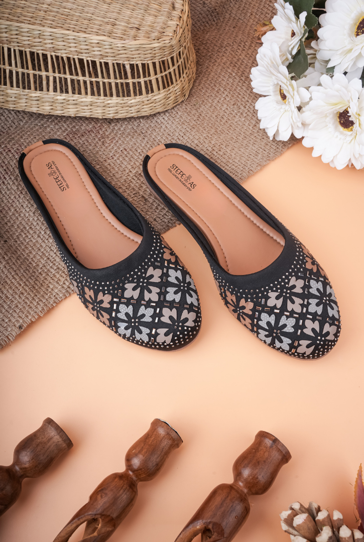 Top view of Stepellas ethnic footwear with a cushioned tan insole and grey floral patterns.