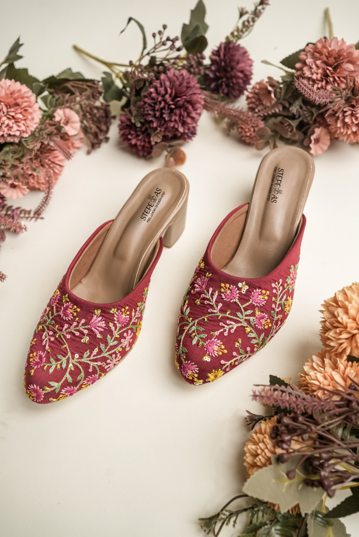 Stepellas luxury maroon heeled mules with elegant pink and gold floral embroidery for bridal wear.