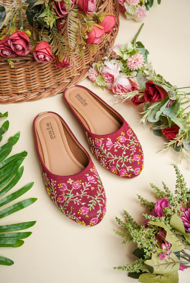 Maroon floral embroidered women juttis by Stepellas with handcrafted detailing