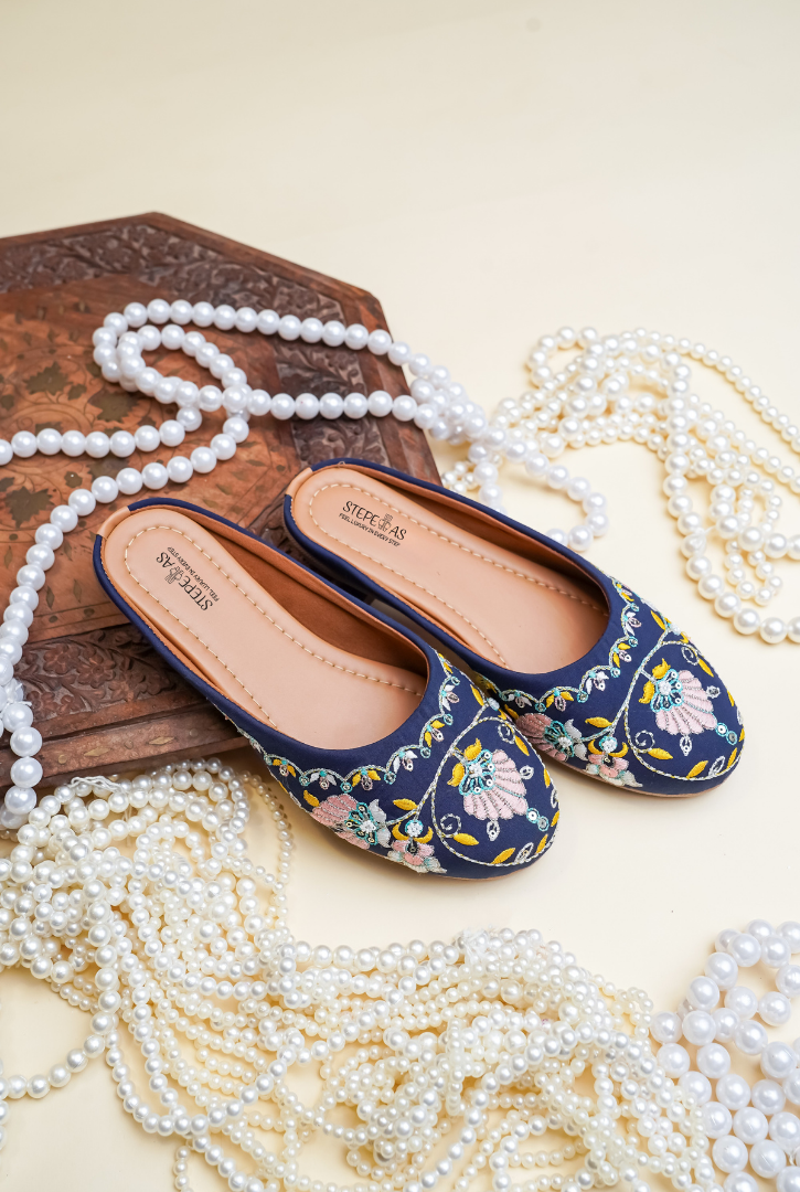 Navy blue floral embroidered women juttis by Stepellas with handcrafted design