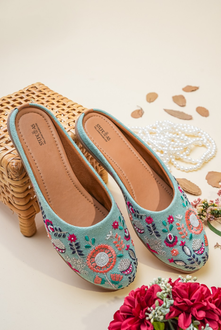 Pista green floral embroidered women juttis handcrafted by Stepellas