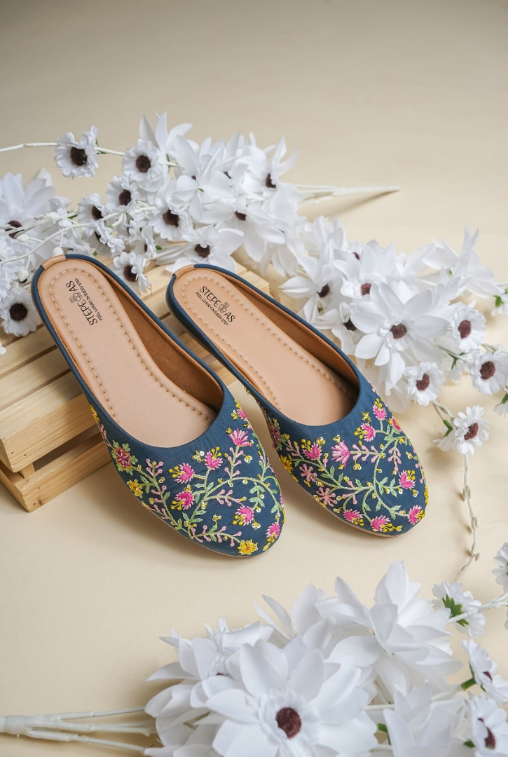 Designer Stepellas royal blue block heels with circular pink floral motifs and gold scalloped threadwork.