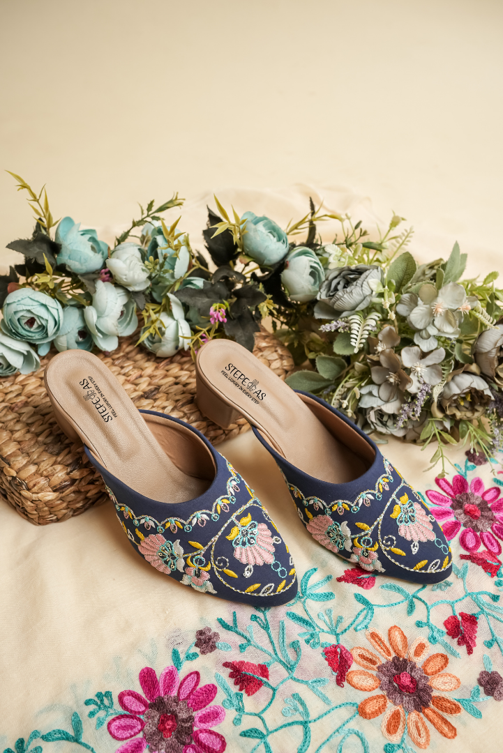 Comparison of Stepellas royal blue embroidered juttis and matching round block heels for ethnic wear.