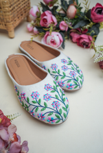 White floral embroidered women juttis for festive and wedding wear